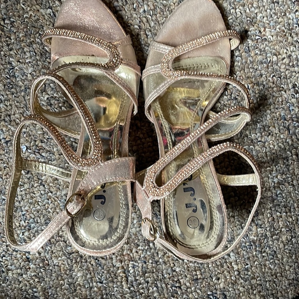 I am selling a pair of J,J.S prom shoes